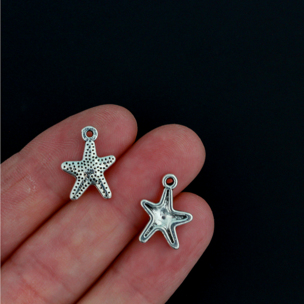 16mm long starfish charms in an antiqued silver-tone color